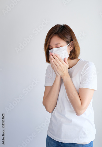 woman wearing mask and cough get sick from corona virus, covid19, flu symptom .