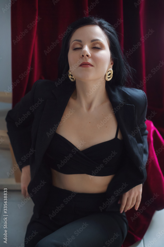 Photo of beautiful young woman in sexual fashion black clothes Photo of beautiful young woman in sexual fashion black clothes