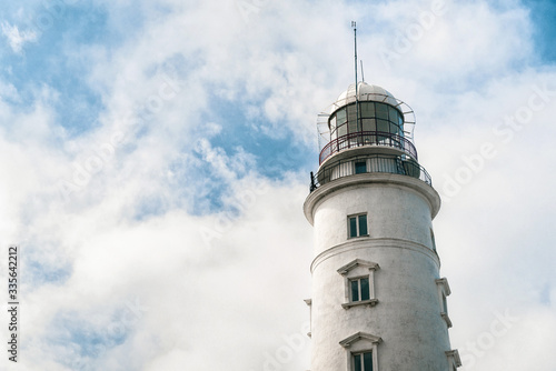 Lighthouse on a background of blue sky