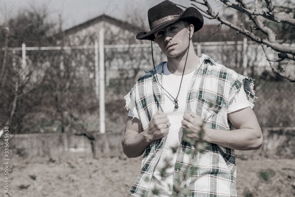 Fototapeta premium Man in country in summer day 