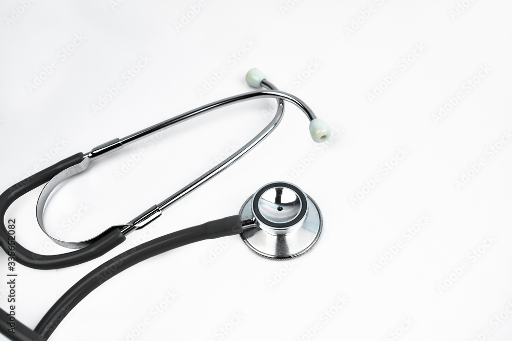 A normal medical stethoscope, an important medical equipment on white background A normal medical stethoscope, an important medical equipment on white background