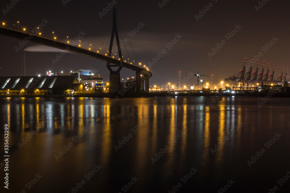 Industrial Harbor of Hamburg at night.