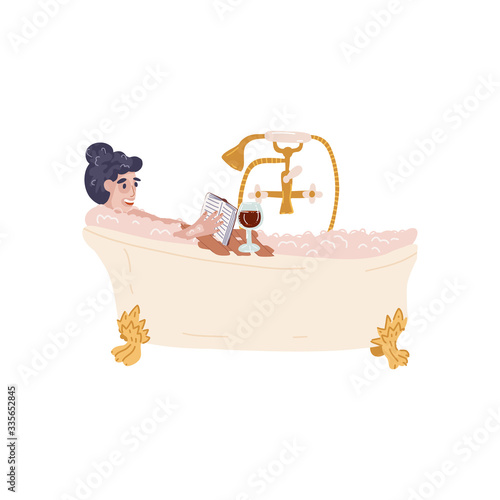 Glamour girl in face and hair mask relaxing in vintage bath on claw foots with bubbles,enjoys glass of red wine and read fun book with smile. Calm, relax, home spa, read book concept.