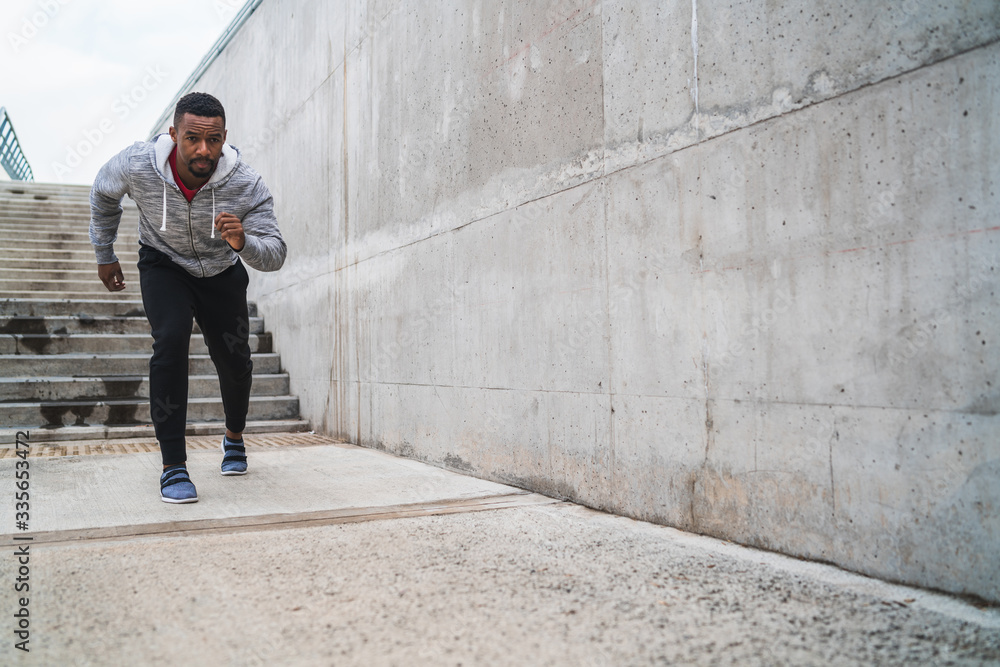 Portrait of an athletic man running. Portrait of an athletic man running.