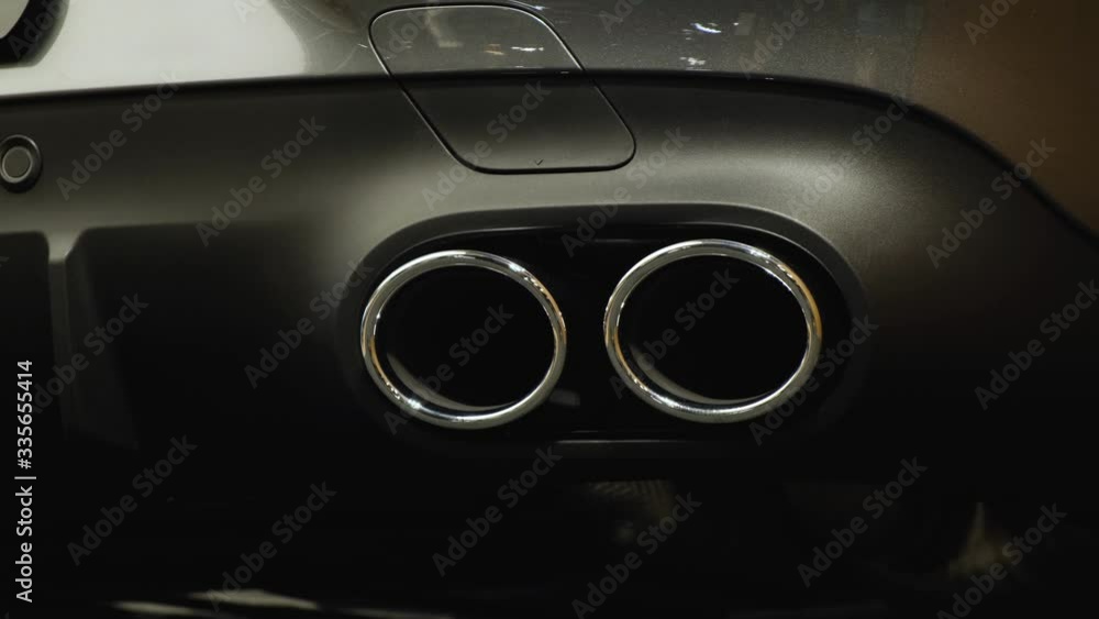 Exhaust pipe of a modern sports car Exhaust pipe of a modern sports car