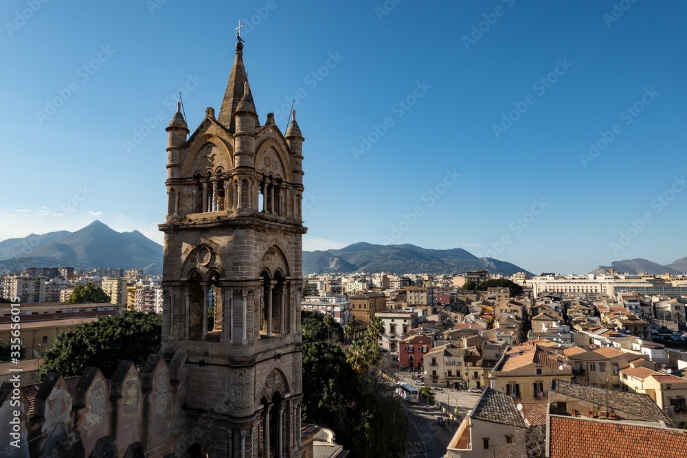 The bell tower of the Palermo Cathedral with the city below