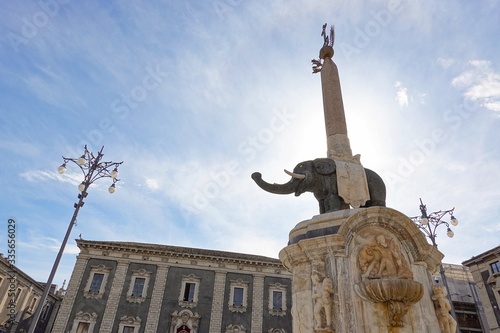 Fontana dell Elefante obelisk in the center of Piazza del Duomo in Catania, Sicily in strong backlight