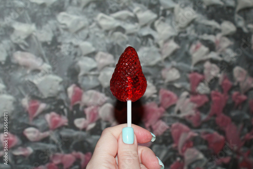 Candy in the form of strawberries lollipop, dessert.
