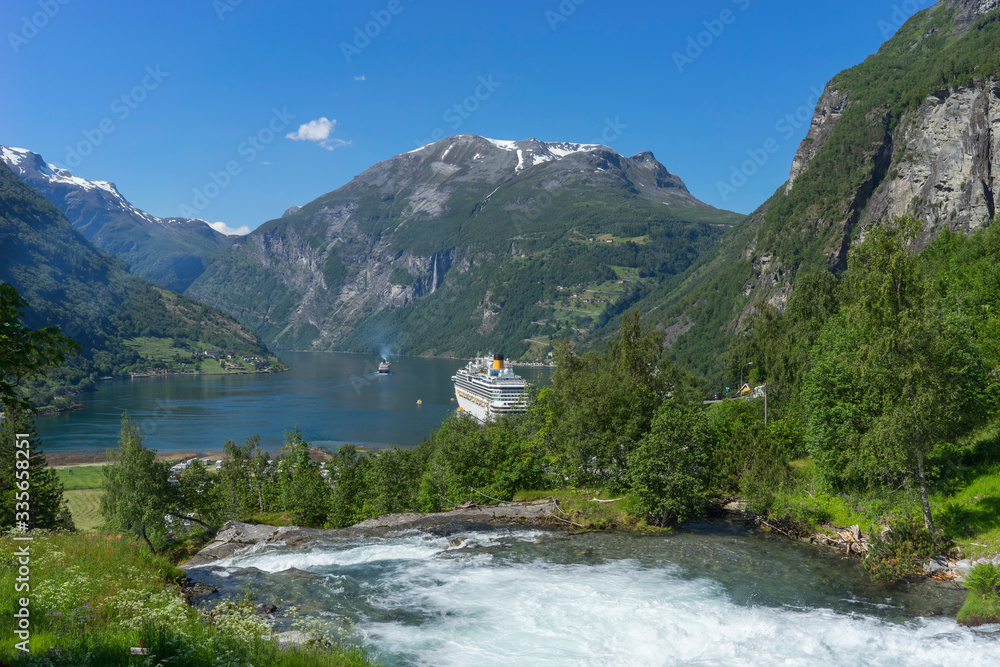 Cruise ship in Geiranger fjord in Norway