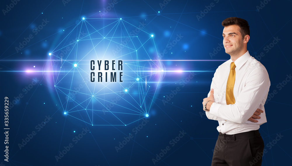 Businessman thinking about security solutions with CYBER CRIME inscription Businessman thinking about security solutions with CYBER CRIME inscription