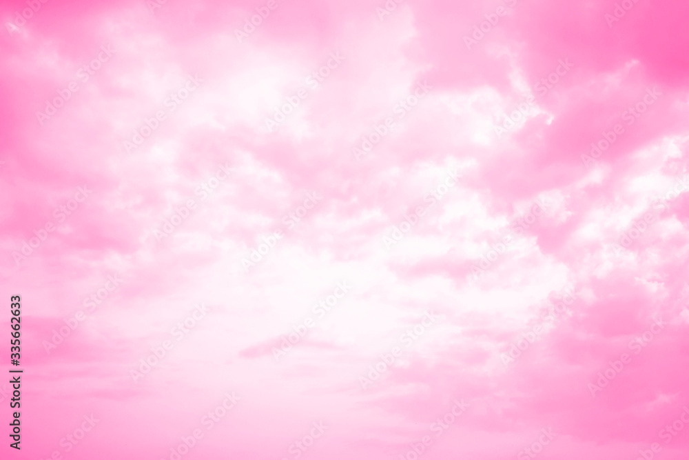Bright pink sky with fluffy marshmallow clouds Bright pink sky with fluffy marshmallow clouds