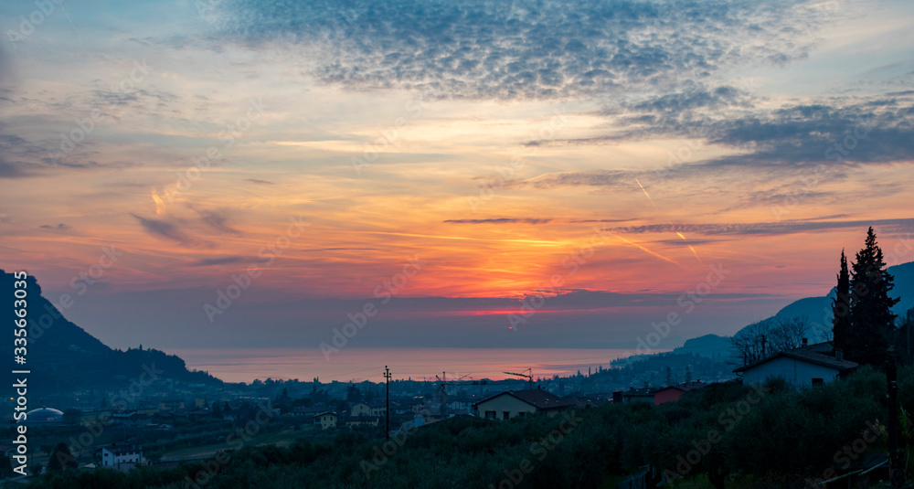 Italy, Veneto, Garda -  8 february 2020 - A sunset seen from Garda