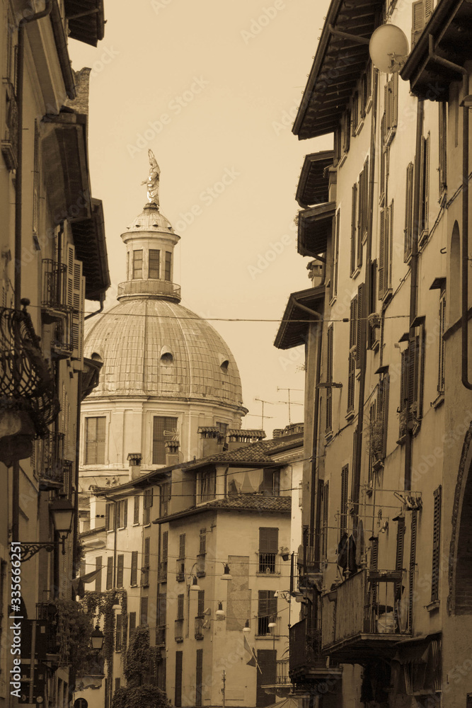 Facade of Santa Maria del Carmine Church in Brescia Old Town, Lombardy, Italy. Antique photo effect.