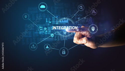 Hand touching INTEGRATION inscription, Cybersecurity concept