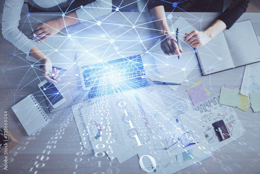 Double exposure of woman hands working on computer and data theme hologram drawing. Top View. Technology concept. Double exposure of woman hands working on computer and data theme hologram drawing. Top View. Technology concept.