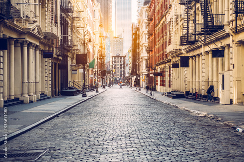 Canvas Print Empty street at sunset time in SoHo district in Manhattan, New York