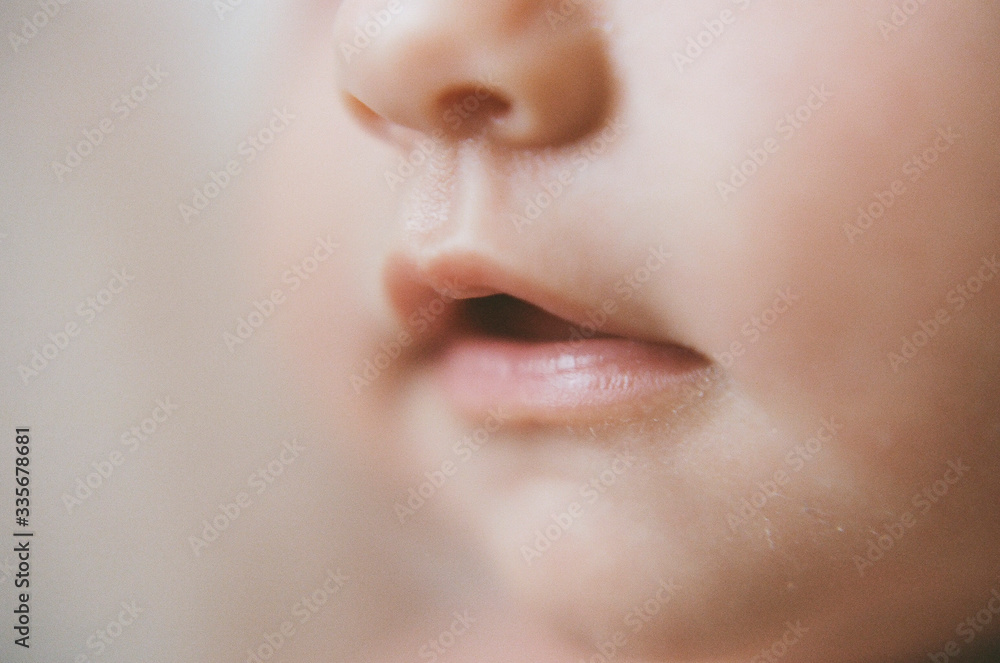 Obraz premium Close up of newborn smiling