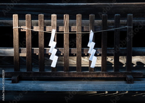 Shide paper strips on the grounds of Suwa Taisha Shimosha Harumiya, one of the four shrines in Suwa Grand Shrine complex photo