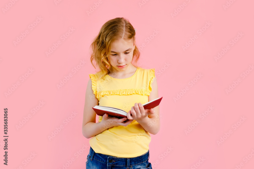 Time to prepare for lessons. Young lovely reader girl holding books in hand and smile isolated on shine pink background Time to prepare for lessons. Young lovely reader girl holding books in hand and smile isolated on shine pink background
