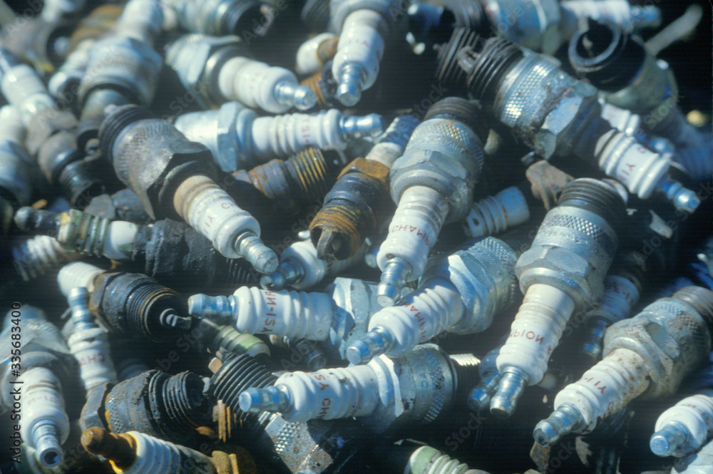A pile of used spark plugs ready for recycling A pile of used spark plugs ready for recycling