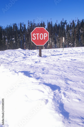 Stop sign in the snow at Grand Teton National Park, Jackson, WY © spiritofamerica