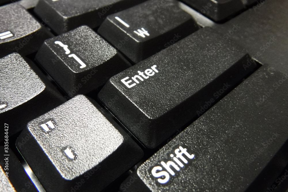 Close-up concept of enter key and shift key on computer keyboard
Close-up concept of enter key and shift key on computer keyboard