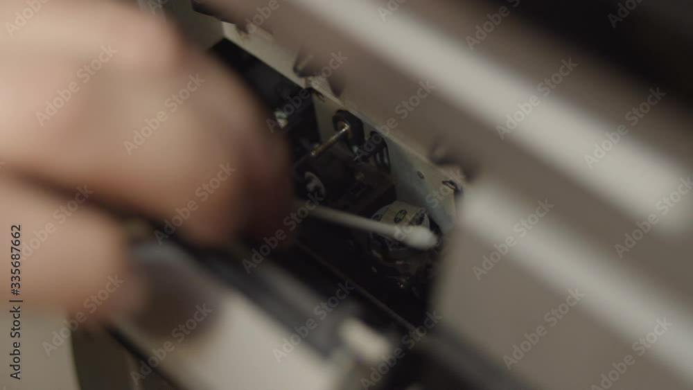 Cleaning heads of audio cassette decks with rubbing alcohol Cleaning heads of audio cassette decks with rubbing alcohol