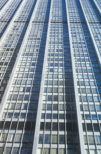 Exterior window patterns viewed from street level, Wall Street, NY