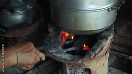 Traditional cooking with charcoal stove Cooking using charcoal stoves is a way of rural people.
