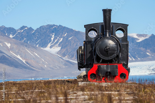 Old industrial train in Ny Alesund, Spitzbergen, Svalbard, Kongsfjord, photo