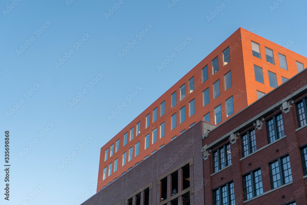 Orange building on clear sky background Orange building on clear sky background