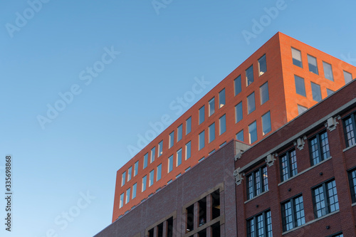 Orange building on clear sky background