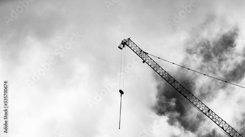 Construction crane on high rise building