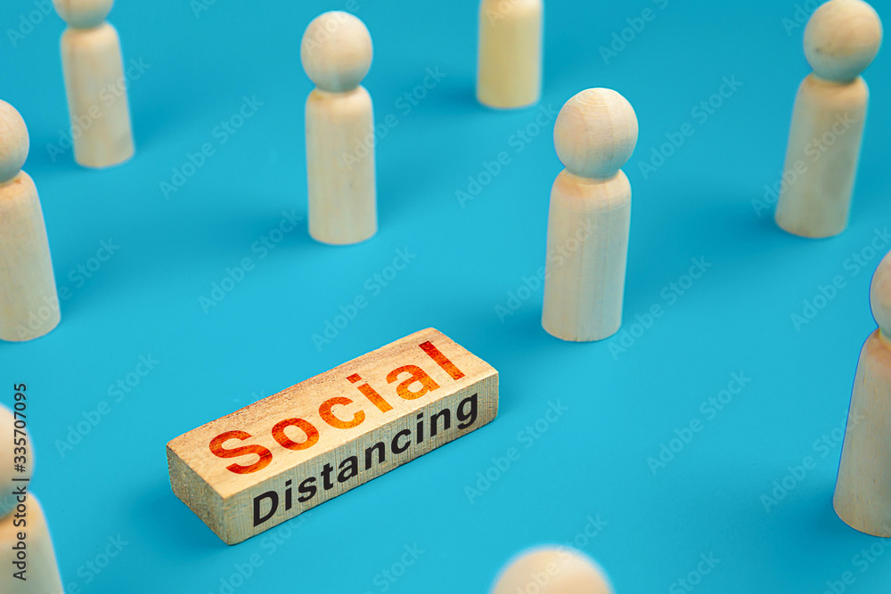 Social distancing for coronavirus (COVID-19) on wooden toy block.Concepts for health and medical prevention and protect of coronavirus infection. Social distancing for coronavirus (COVID-19) on wooden toy block.Concepts for health and medical prevention and protect of coronavirus infection.