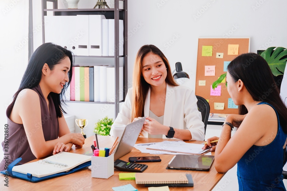 Group of beautiful Asian women meeting in office to discussion or brainstorm business startup project.Concept of teamwork of empower woman.