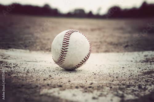 Baseball sitting on a base