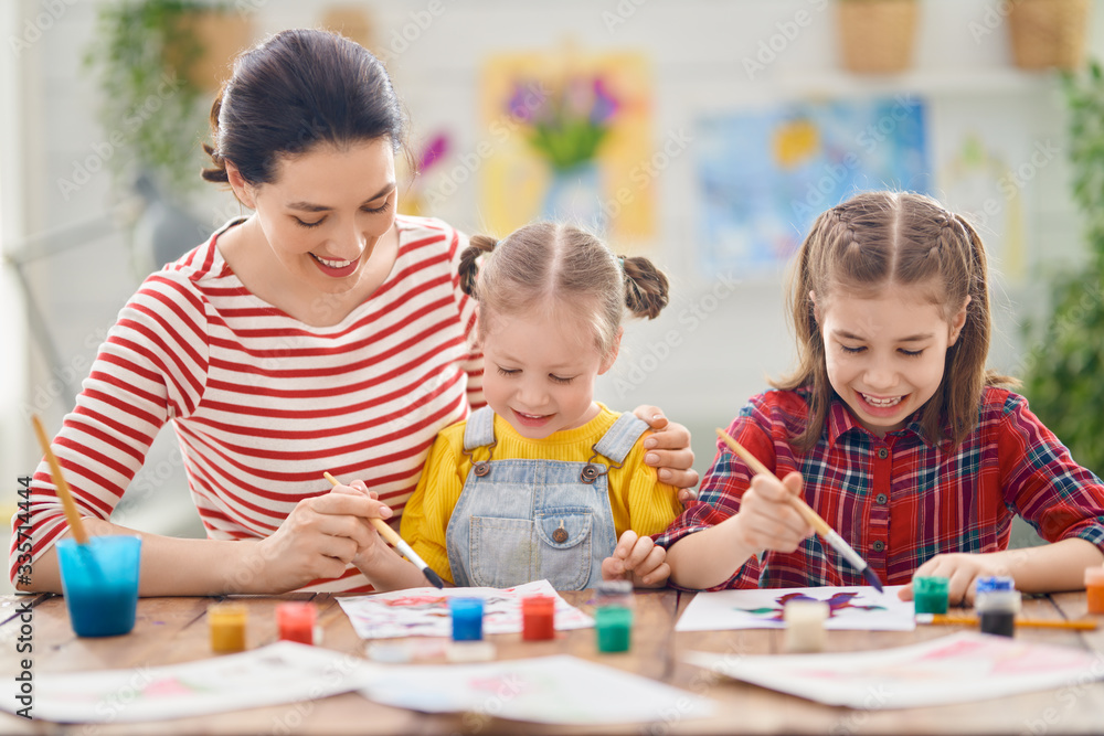 Happy family painting together.