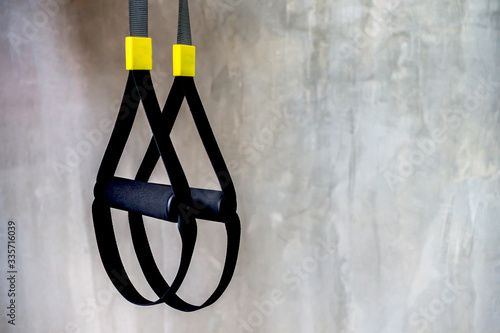 
A fitness equipment called trx that was prepared for playing at noon in a gym in Chiang Mai.