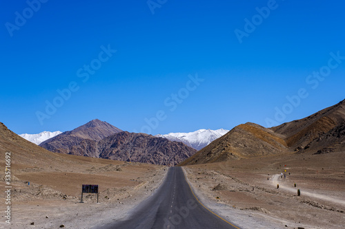 Long straight road to Magnetic Hill in Leh, Ladakh