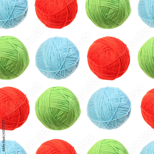 Seamless pattern. Clew of woolen thread isolated. Color ball of woolen. Red, green and blue knit. Knitting.