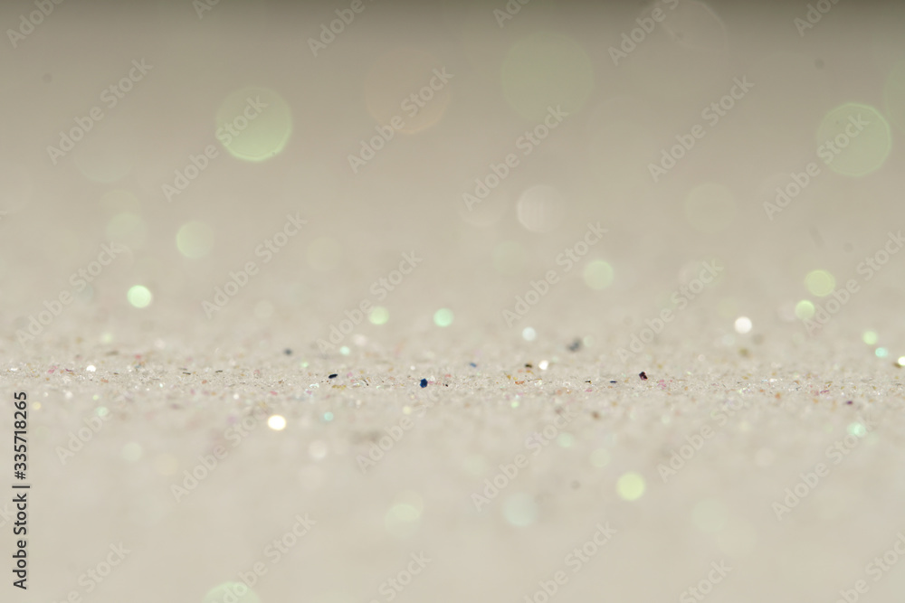 silver Sparkling Lights Festive background with texture. Abstract Christmas twinkled bright bokeh defocused and Falling stars. Winter Card or invitation. silver Sparkling Lights Festive background with texture. Abstract Christmas twinkled bright bokeh defocused and Falling stars. Winter Card or invitation.