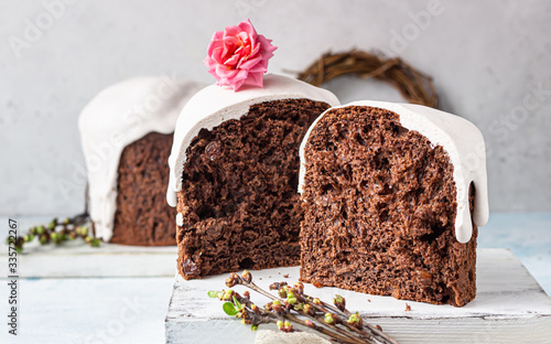 Photography Sweet orthodox chocolate bread (kulich) decorated meringue on light background