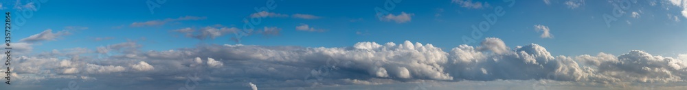 Obraz premium Fantastic clouds against blue sky, panorama