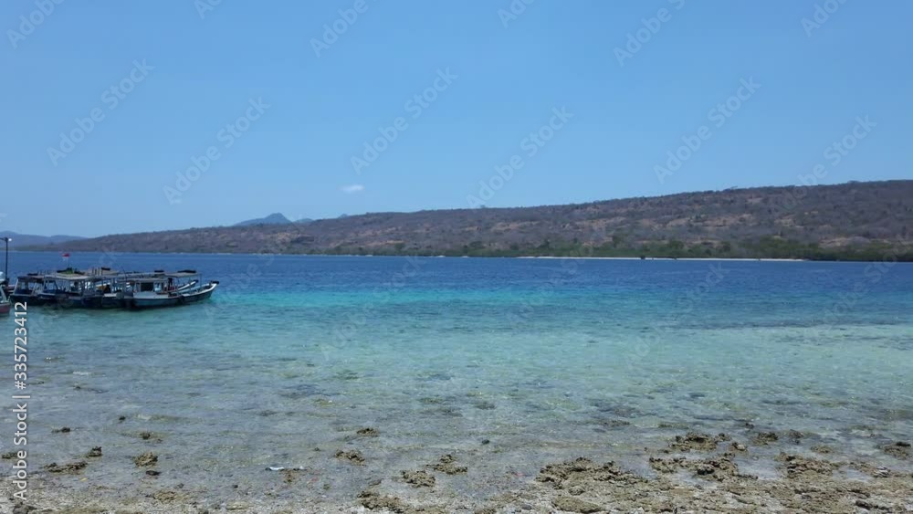 Peaceful turquoise and white beach of Menjangan Peaceful turquoise and white beach of Menjangan