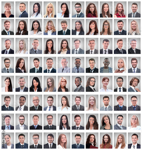 portraits of a group of successful employees isolated on white
