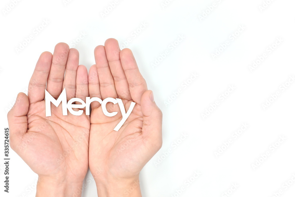 Praying hands asking for mercy in white background. Covid-19 corpnavirus pandemic world crisis. Praying hands asking for mercy in white background. Covid-19 corpnavirus pandemic world crisis.