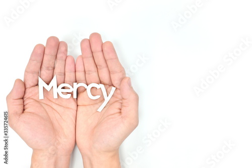 Tableau sur toile Praying hands asking for mercy in white background