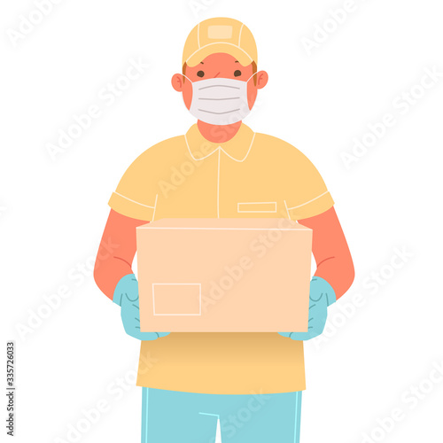 Courier in a medical mask and gloves with a parcel. Delivery service worker during coronavirus outbreak COVID-19