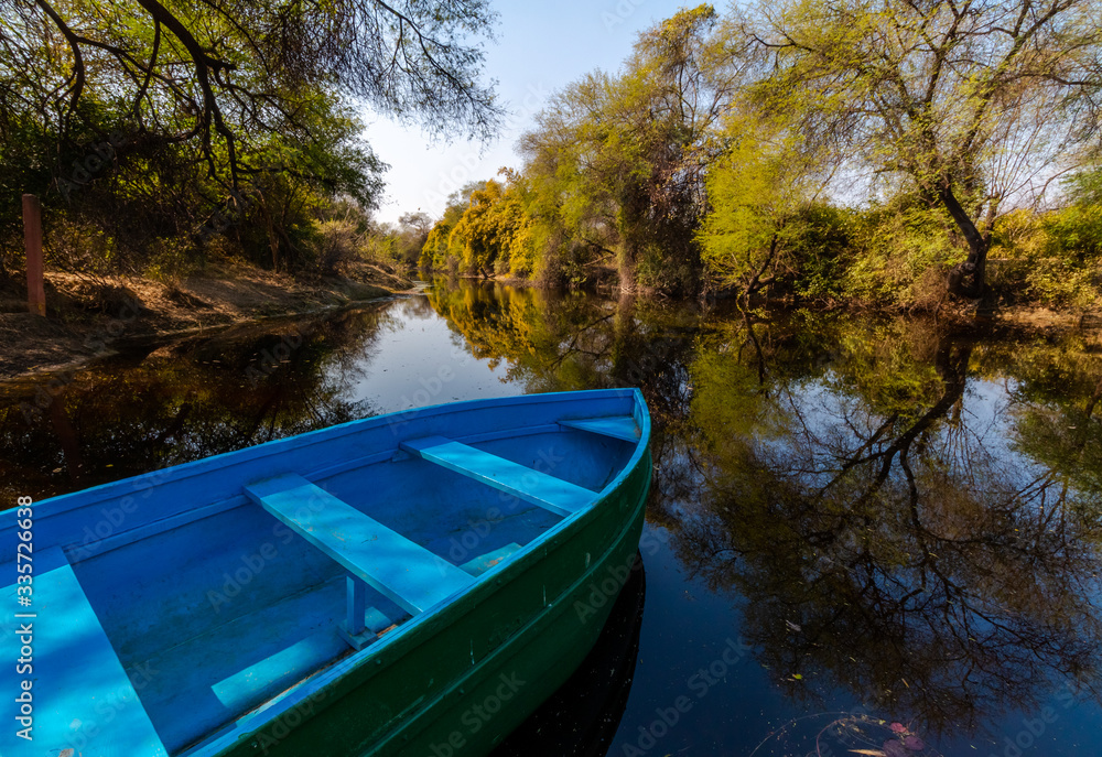 Beautiful scenery of Boat and Lake in Bharatpur Bird Sanctuary, Rajasthan, India a UNESCO World Heritage Site