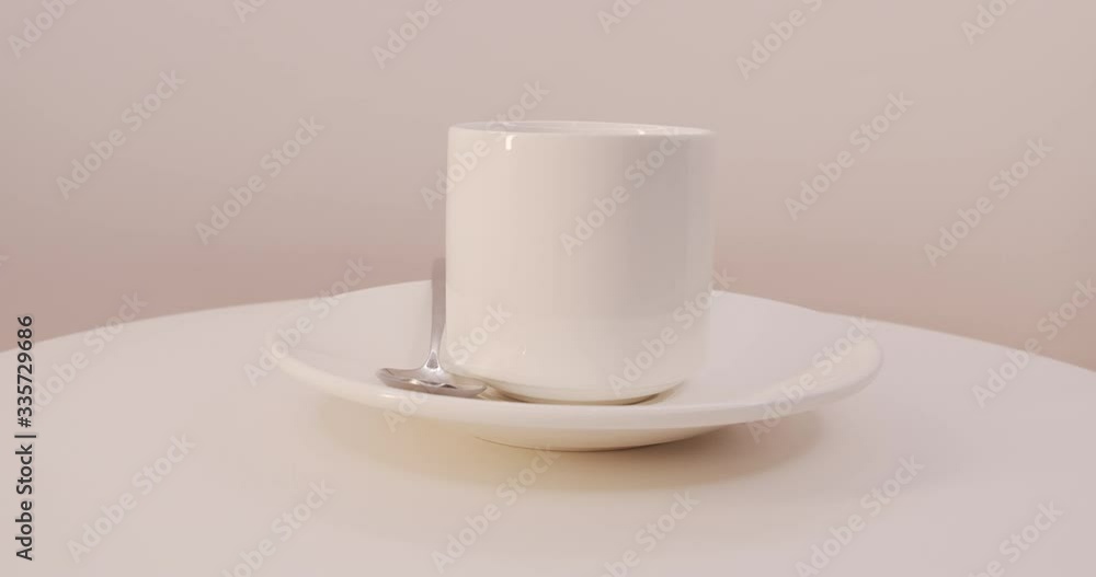 Cup with spoon on a saucer, for coffee Cup with spoon on a saucer, for coffee